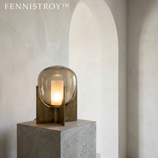 FENNISTROY™ The Meridian Globe Luminaire "A delicate ecosystem of light, grounded by the gravity of solid brass."